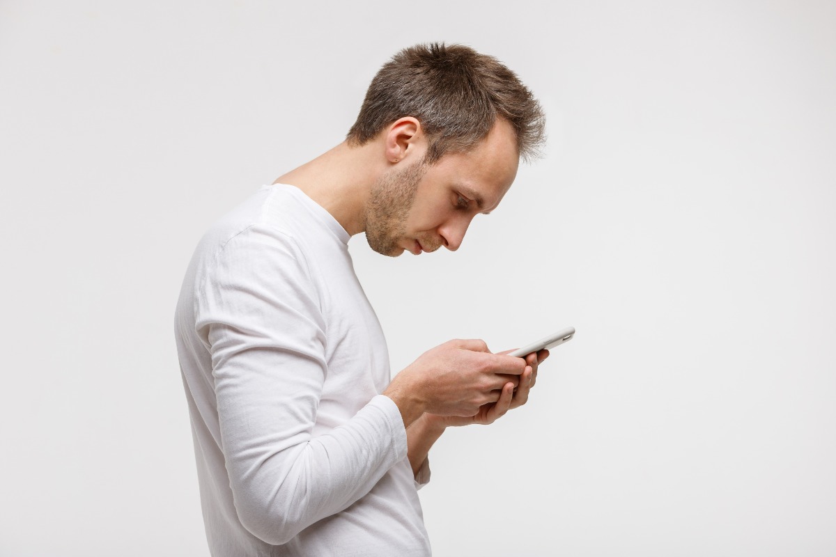 Text Neck: The Impact Looking Down At Your Phone Has On Your Neck & Spine 1 Text Neck: The Impact Looking Down At Your Phone Has On Your Neck & Spine